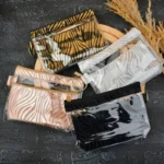 کیف آرایشی دو تیکه طلقی طرح پلنگی