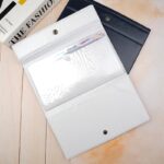 کیف دسته چکی دکمه دار طلق دار